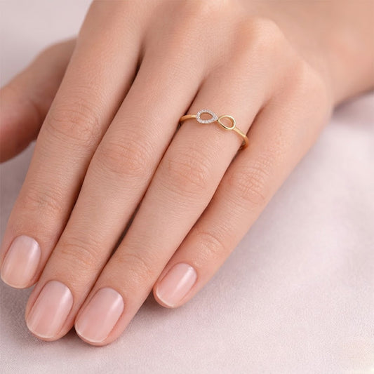 Infinity teardrop motif diamond gold ring