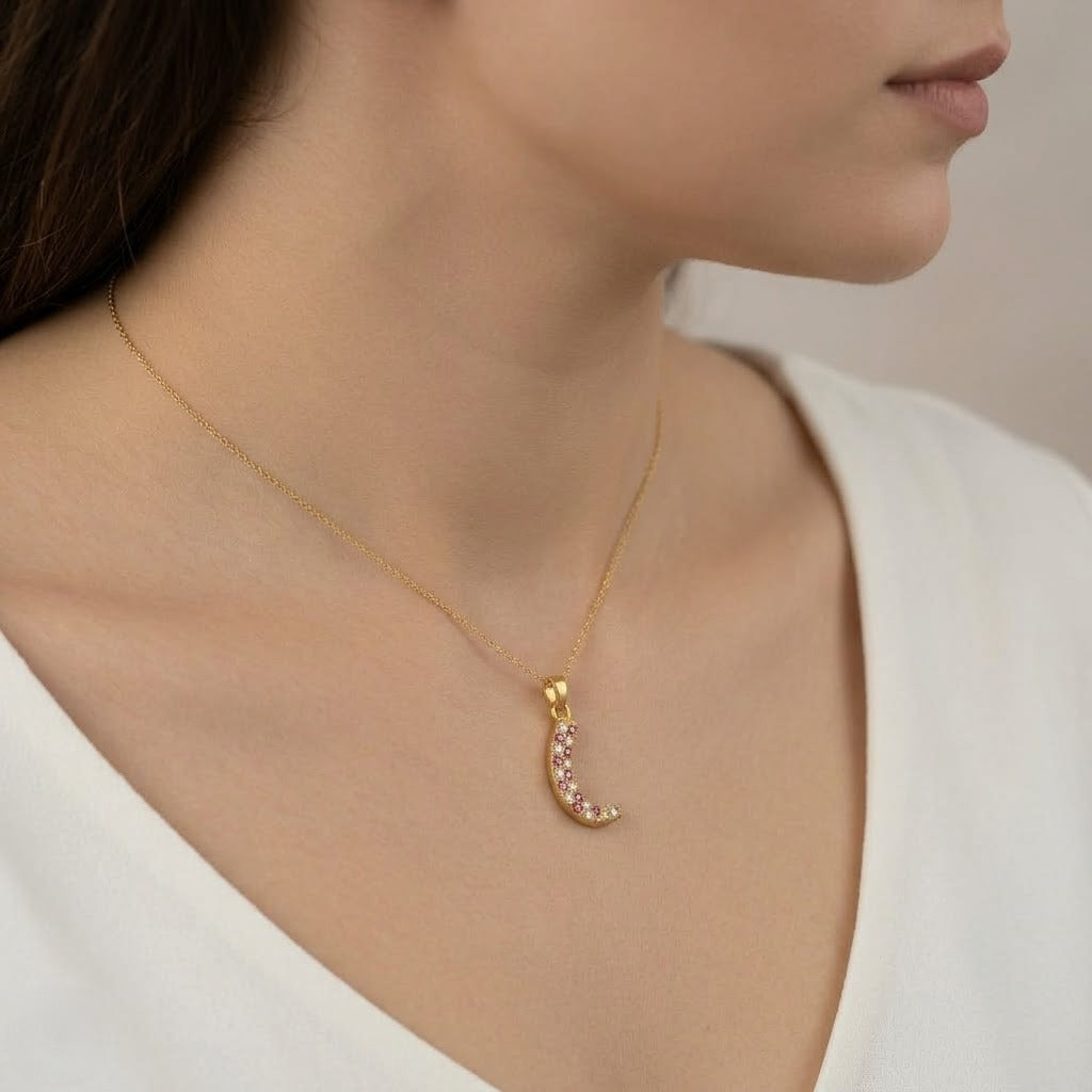 Playful curved multistone diamond gold pendant