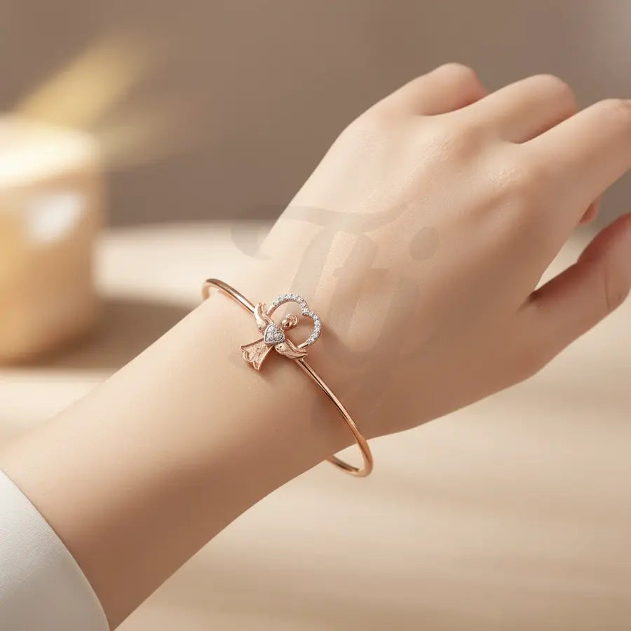 Angel's Tender Wings Gold Bangle