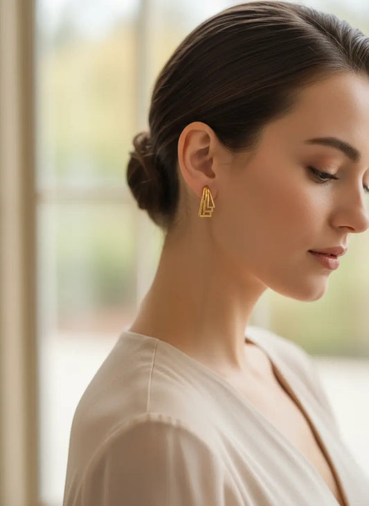 Wings of Strength Gold Earrings
