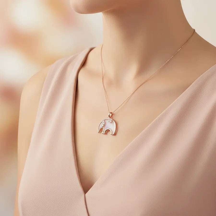 Gentle Elephant Walk Gold Pendant