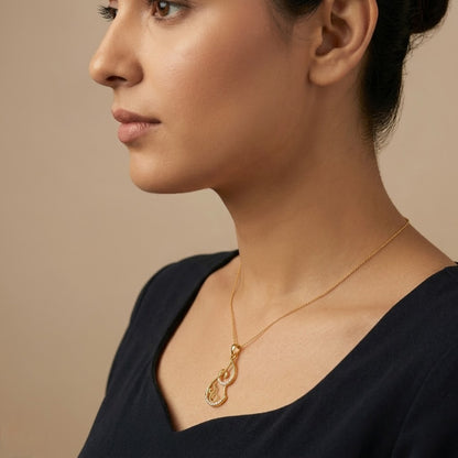 Elegant Gold Musical Swirl Diamond Pendant
