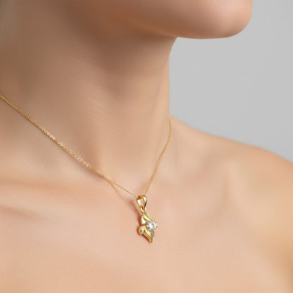 Graceful Wave Motif Accents Diamond Gold Pendant