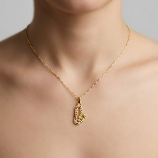 Open heart pendant in 9K yellow gold formed by two curved lines set with diamonds