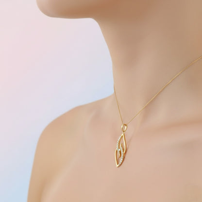 Flowing Curve Stone Accent diamond gold pendant