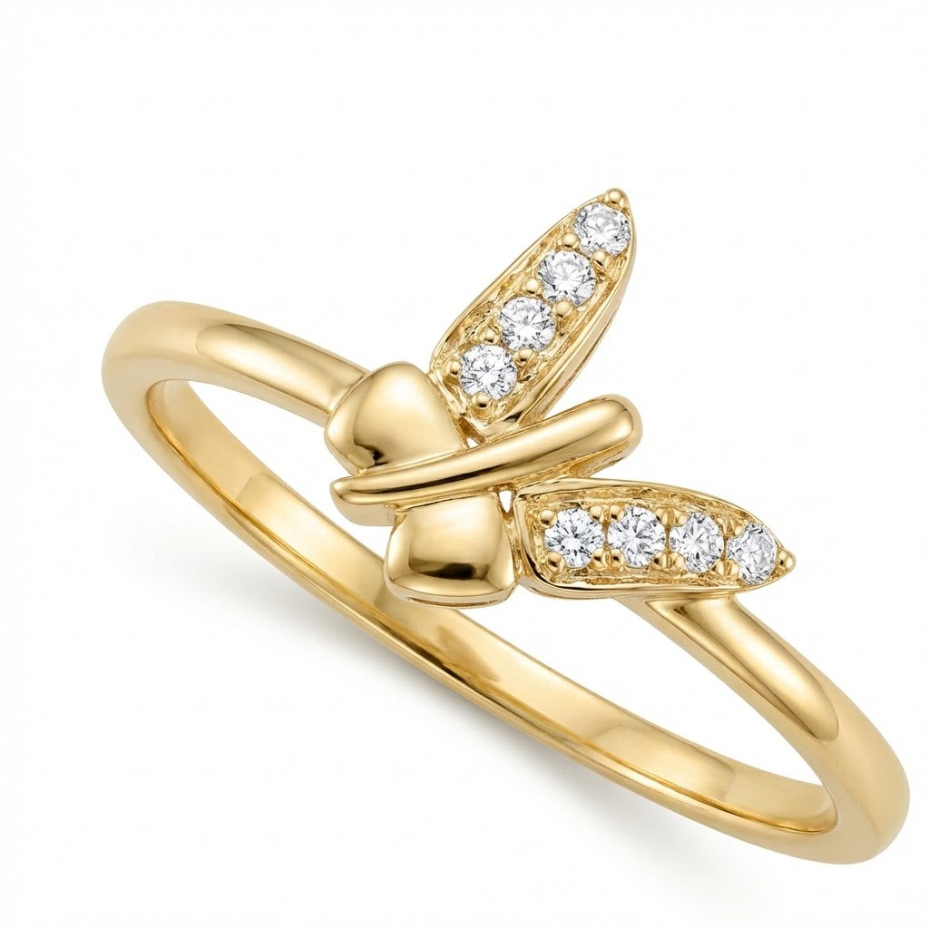 Butterfly Beauty ring in 9K yellow gold with crossed wing shapes set with small diamonds