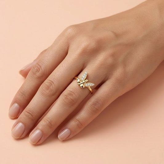 Butterfly Beauty ring in 9K yellow gold with crossed wing shapes set with small diamonds