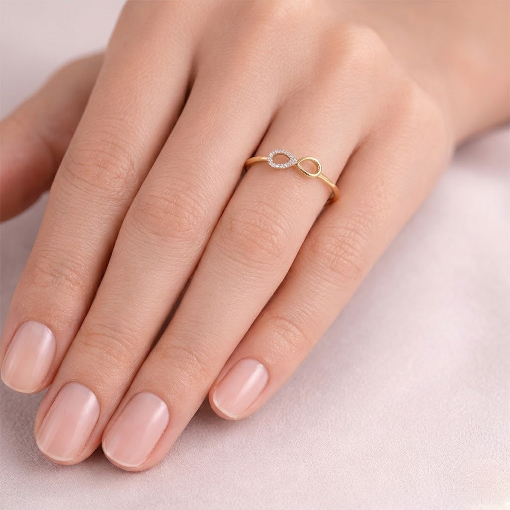 Infinity teardrop motif diamond gold ring
