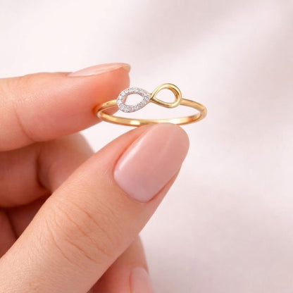 Infinity teardrop motif diamond gold ring