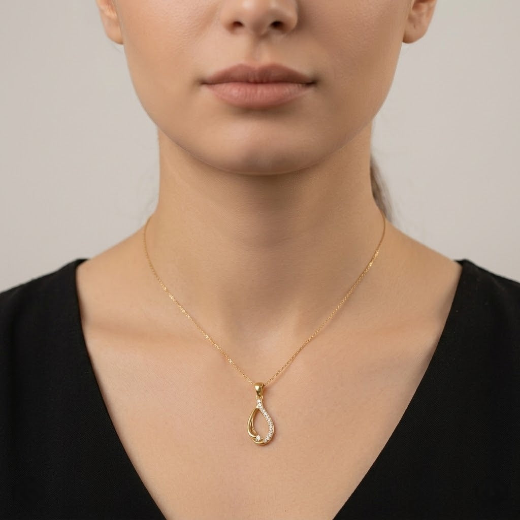 Graceful Flowing Teardrop Motif diamond gold pendant