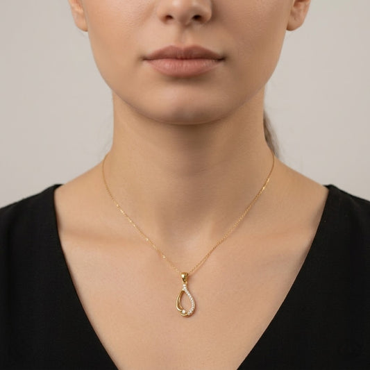 Graceful Flowing Teardrop Motif diamond gold pendant