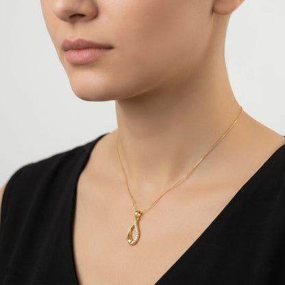 Graceful Flowing Teardrop Motif diamond gold pendant