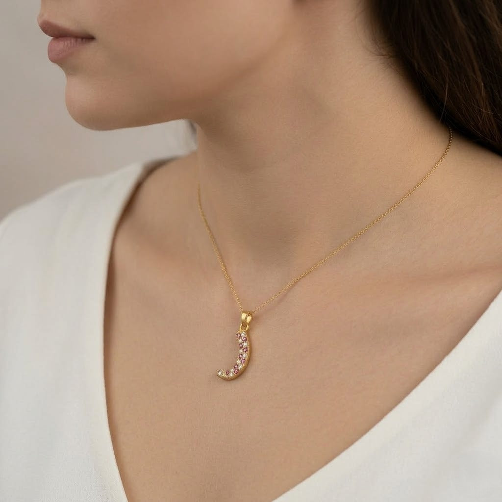 Playful curved multistone diamond gold pendant