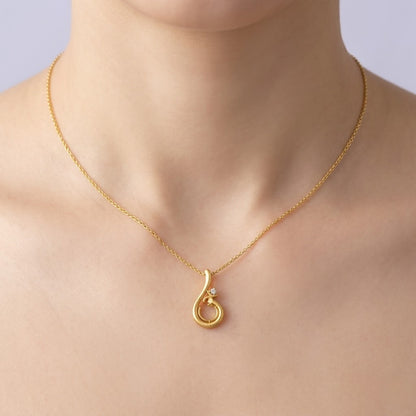 Graceful swirl motif diamond gold pendant