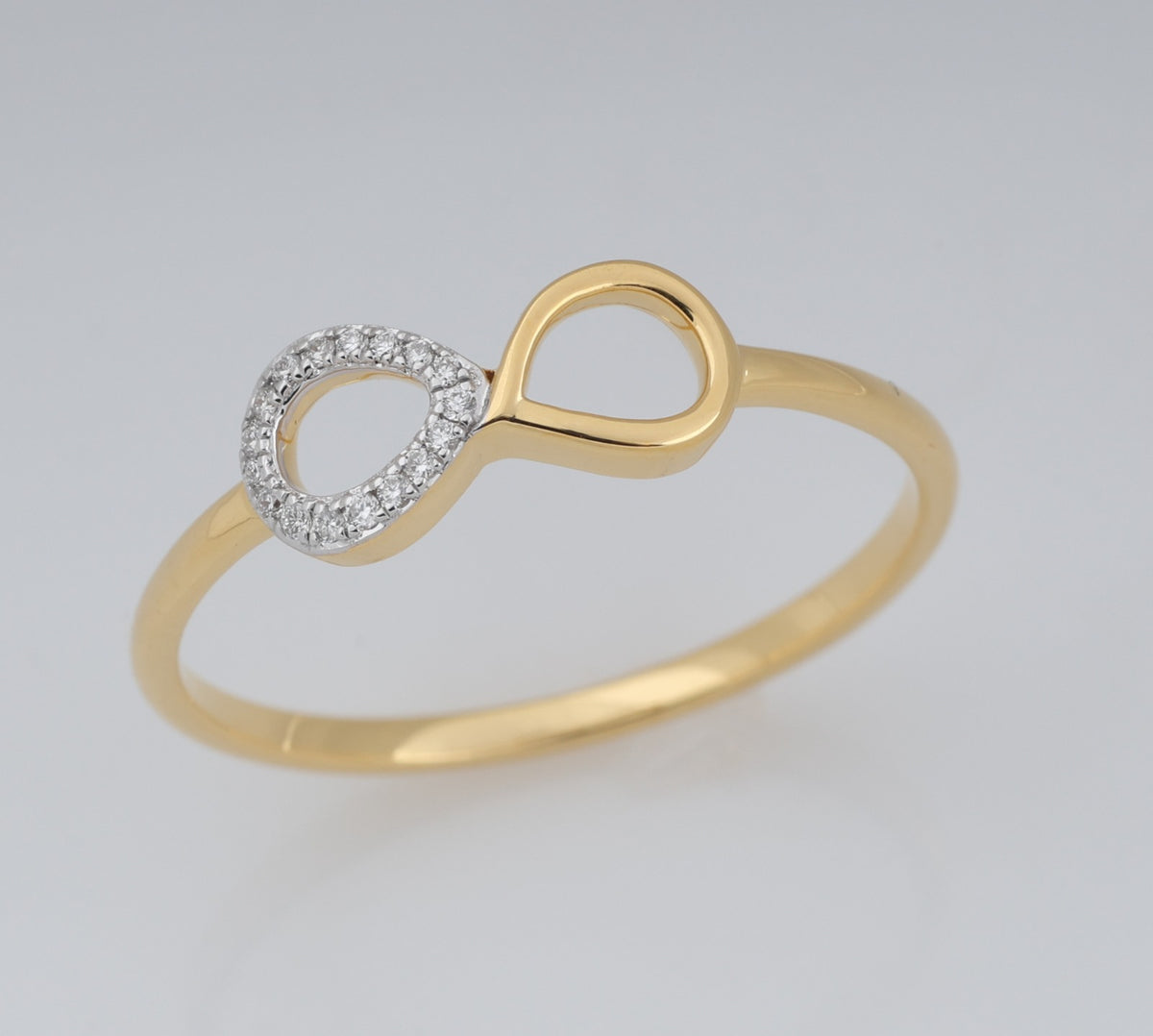 Infinity teardrop motif diamond gold ring