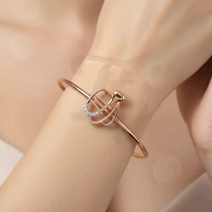 Melodic Trumpet Vibes Gold Bangle