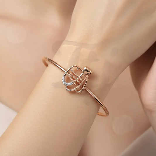 Melodic Trumpet Vibes Gold Bangle