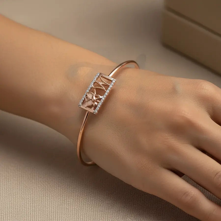 Butterfly's Gentle Touch Gold Bangle