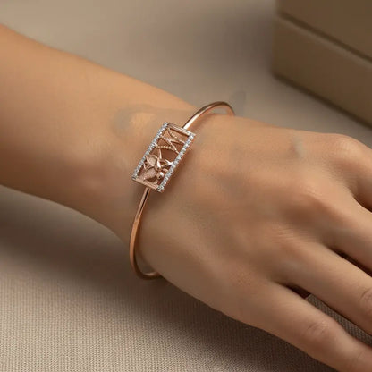 Butterfly's Gentle Touch Gold Bangle