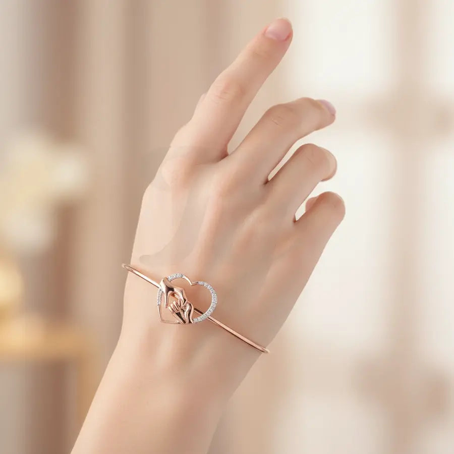 Holding Hands Gold Bangle