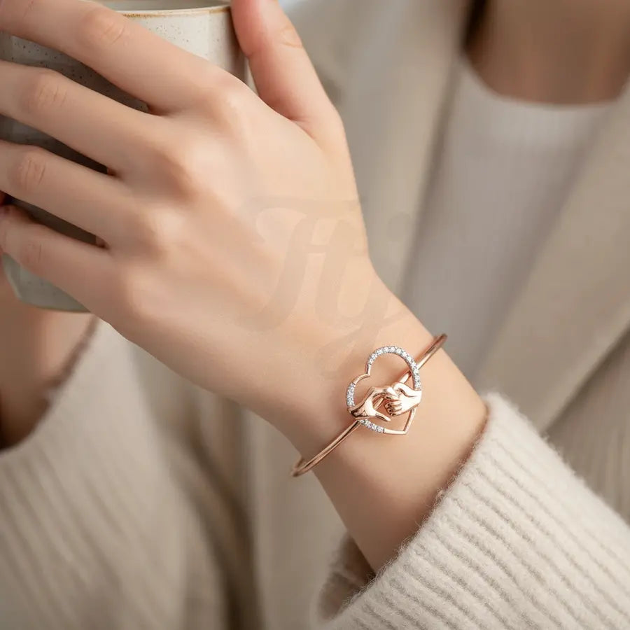 Holding Hands Gold Bangle