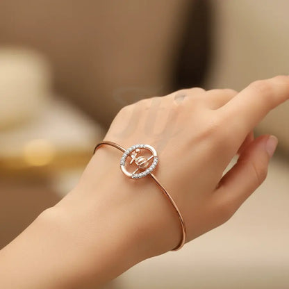 Rhythmic Beats Gold Bangle