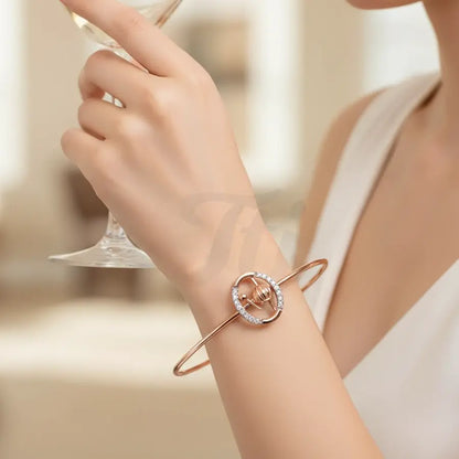 Rhythmic Beats Gold Bangle