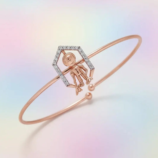 Grace in Motion Gold Bangle