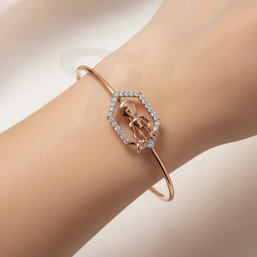 Grace in Motion Gold Bangle