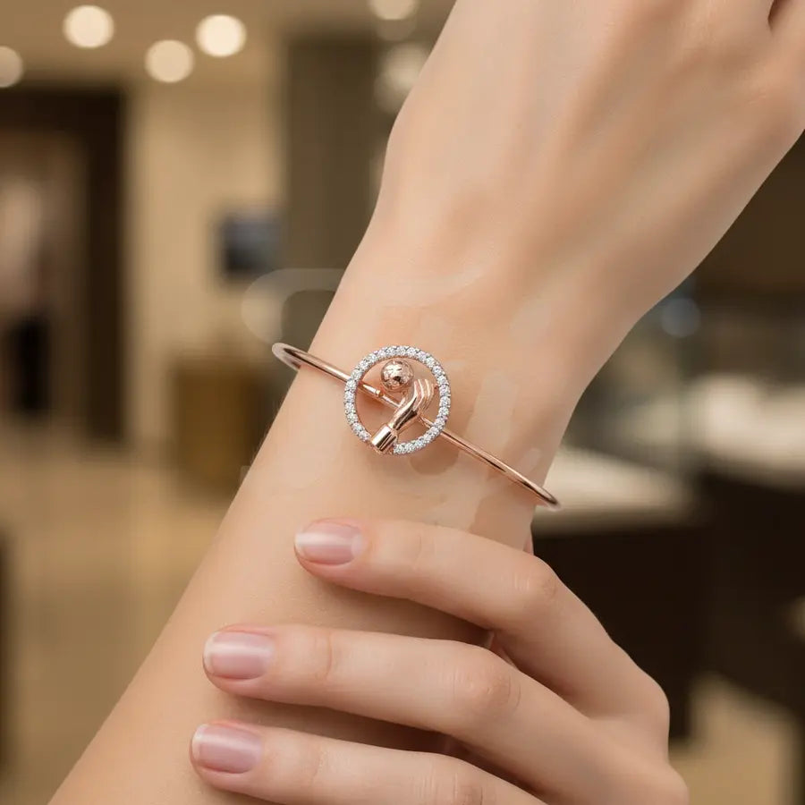 World in Hands Gold Bangle
