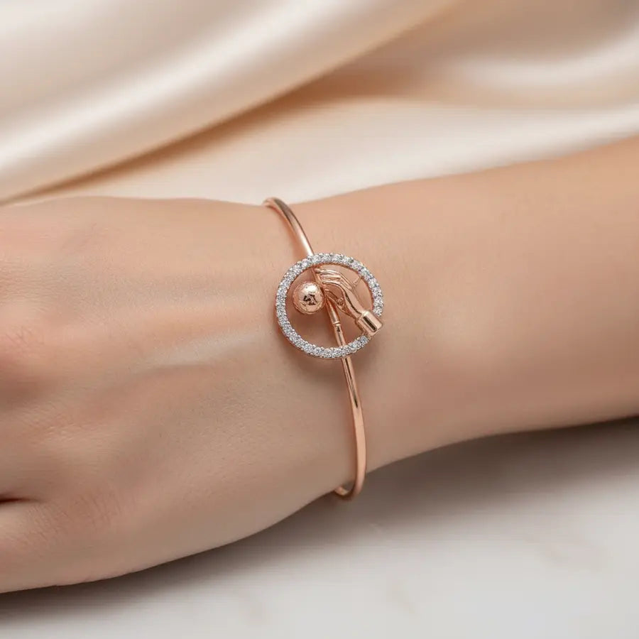 World in Hands Gold Bangle