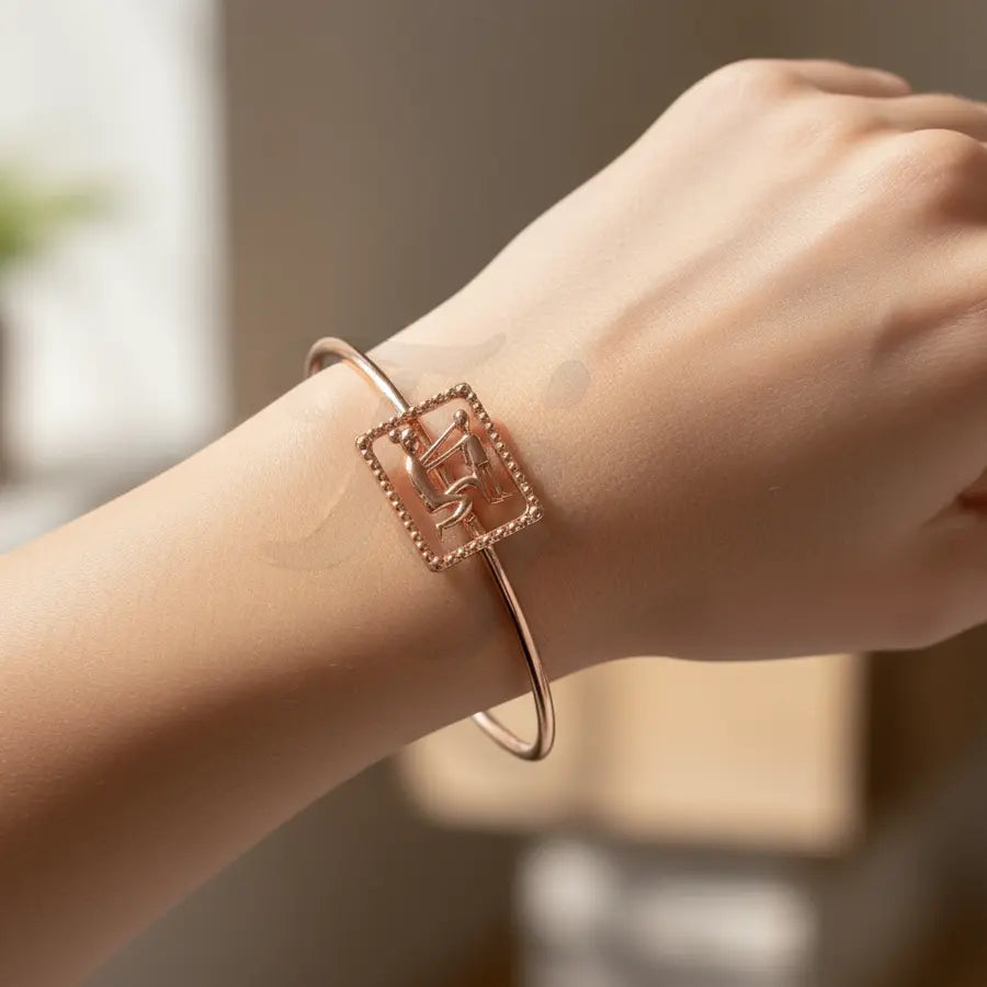 Mother's Loving Care Gold Bangle