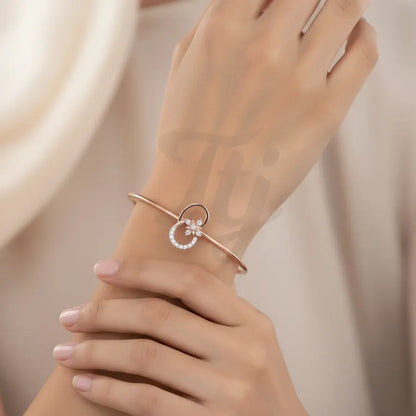 Flower motif with sparkling stone Gold Bangle