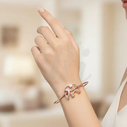 Minimal elephant Gold Bangle