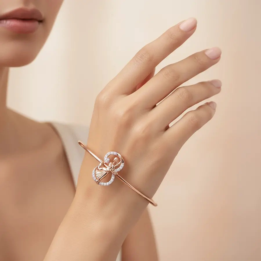 Elegant Pose Artistry Gold Bangle