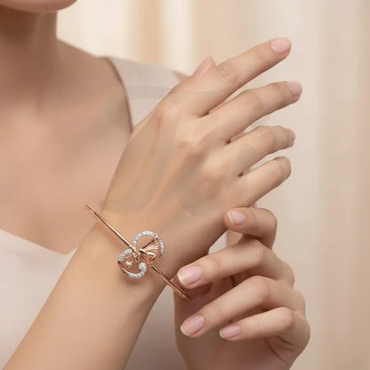 Elegant Pose Artistry Gold Bangle