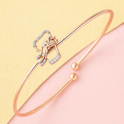 Melodic Raaga Essence Gold Bangle