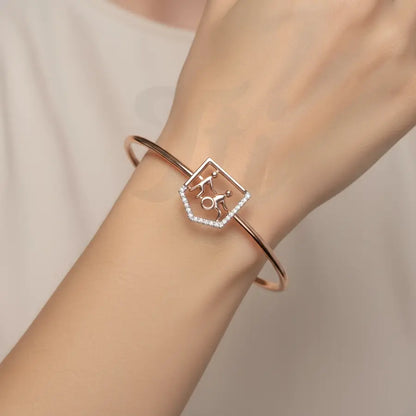 Compassionate Helping Hand Gold Bangle