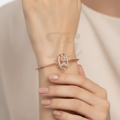 Flowing Floral Arc Gold Bangle