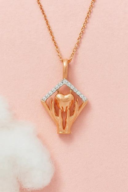 Carrying Hearts Forward Gold Chain and Pendant