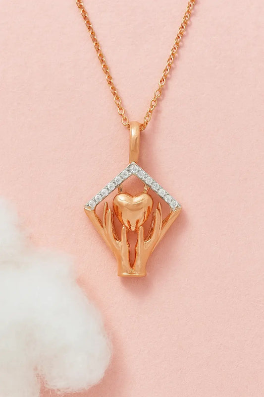 Carrying Hearts Forward Gold Chain and Pendant