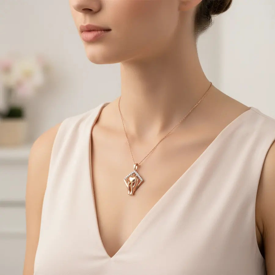 Carrying Hearts Forward Gold Chain and Pendant