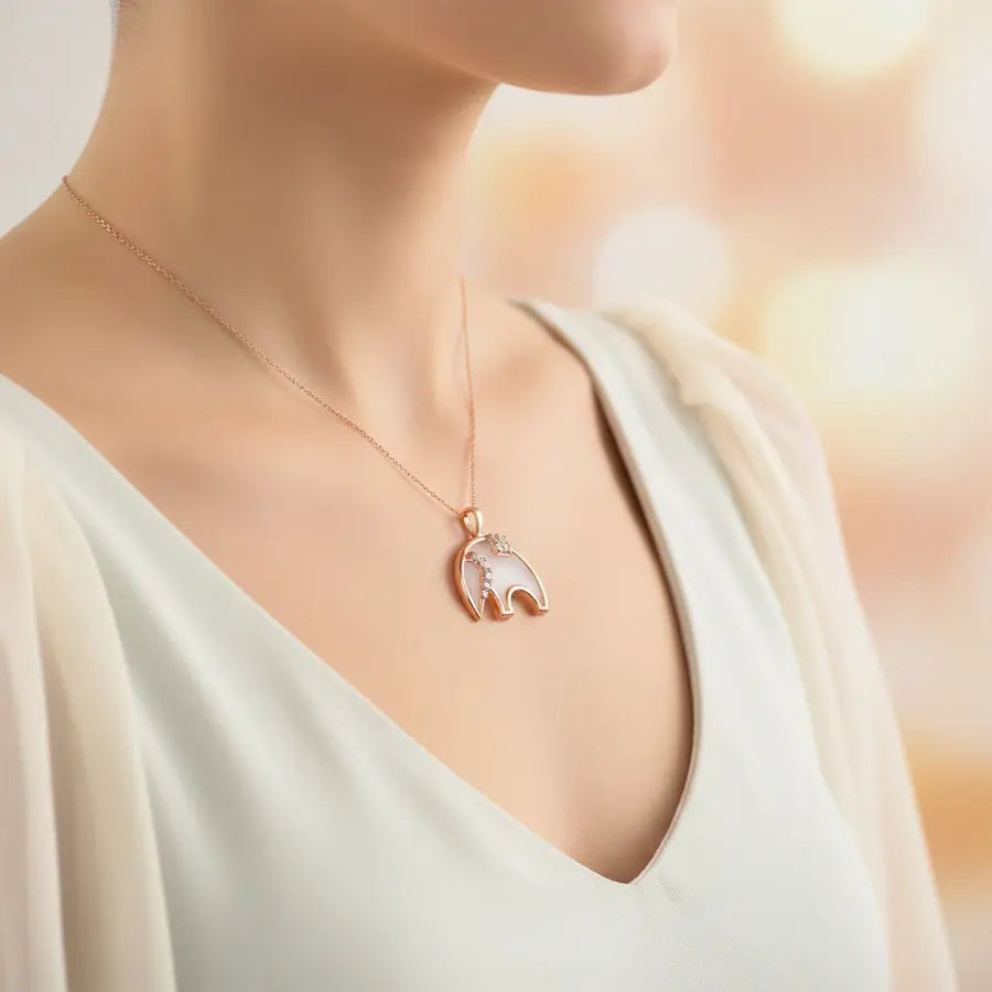 Gentle Elephant Walk Gold Pendant