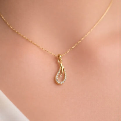 Elegant Gold Teardrop Diamond Pendant