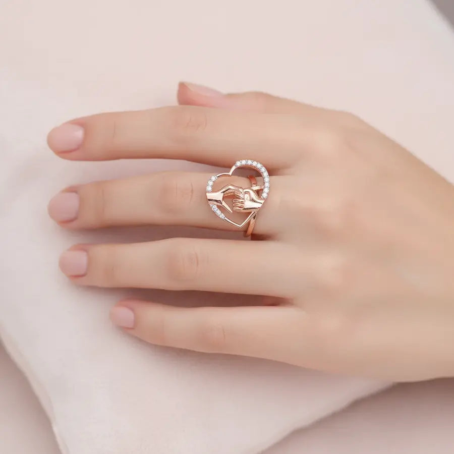 Holding Hands Gold Ring