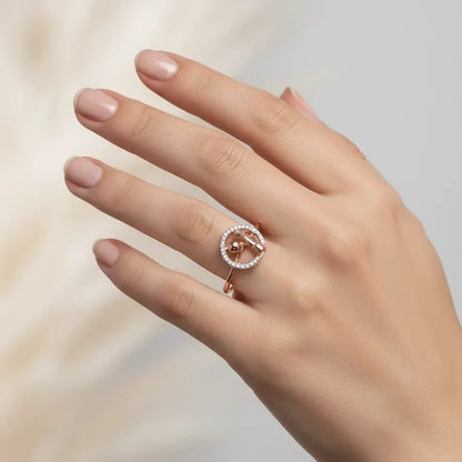 Hand and Globe Gold Ring