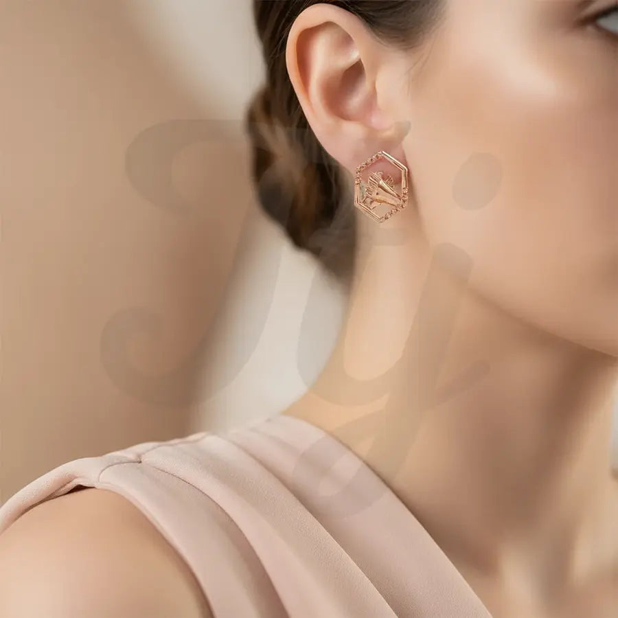 Twin Hands Holding Gold Earrings
