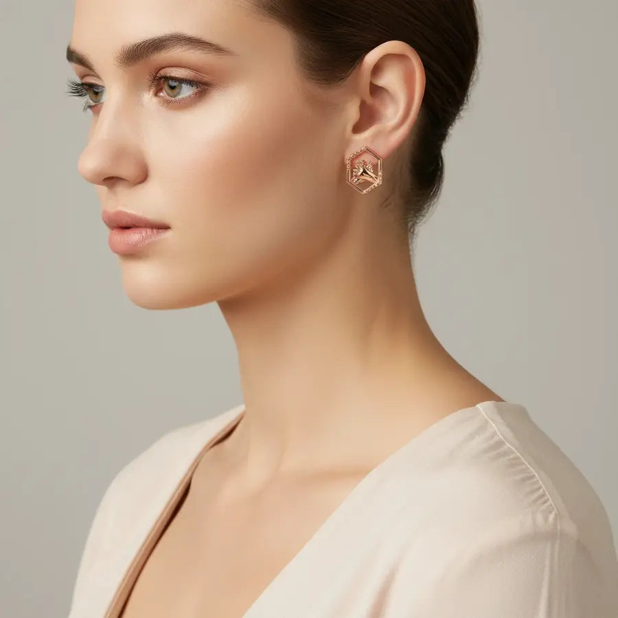 Twin Hands Holding Gold Earrings